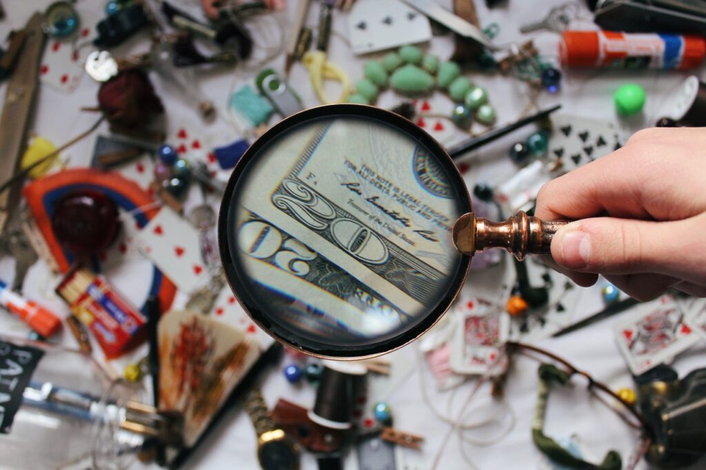 Magnifying glass on money